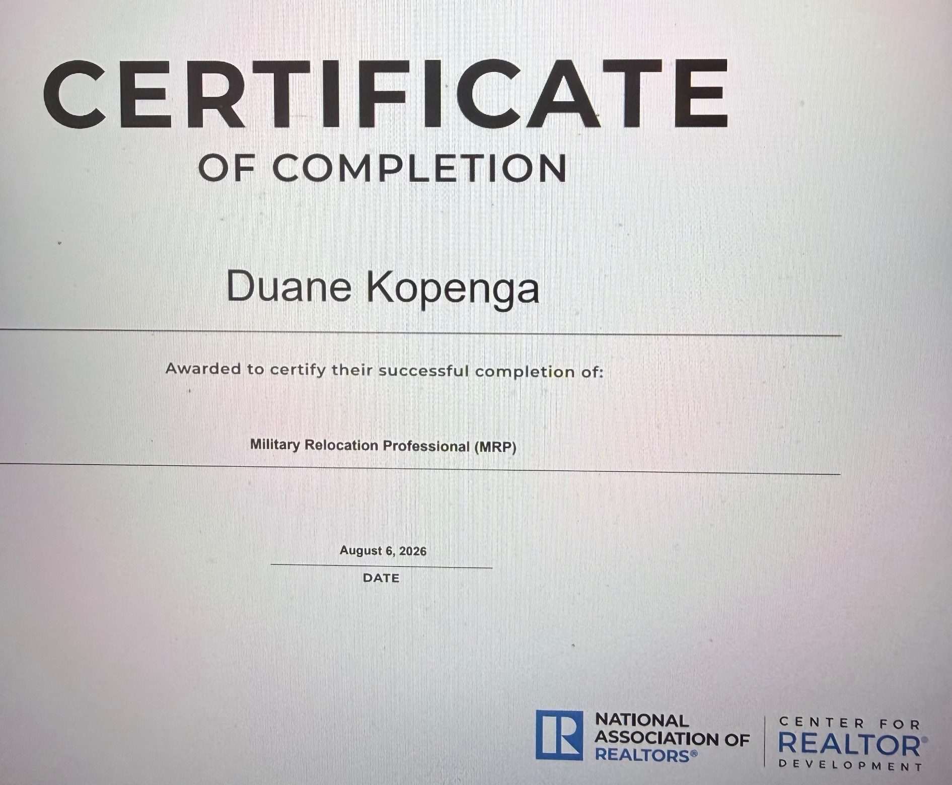 Military Relocation Professional (MRP) certificate of completion awarded to Duane Kopenga by the National Association of REALTORS Center for REALTOR Development